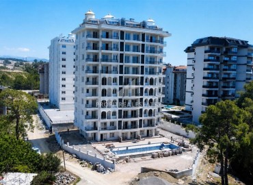 Двухкомнатные апартаменты, 48м², в новостройке с отельной инфраструктурой в 1500м от моря в Авсалларе, Алания ID-19317 фото-1