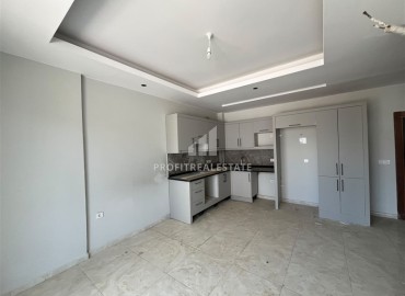 Двухкомнатные апартаменты, 48м², в новостройке с отельной инфраструктурой в 1500м от моря в Авсалларе, Алания ID-19317 фото-2