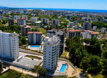 Двухкомнатные апартаменты, 48м², в новостройке с отельной инфраструктурой в 1500м от моря в Авсалларе, Алания ID-19317 фото-14