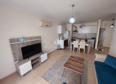 Просторная меблированная квартира с одной спальней, 60м², в комфортабельной резиденции в Махмутларе, Алания ID-19326 фото-2