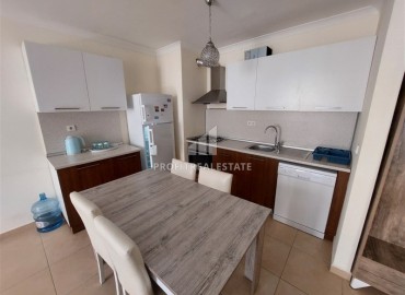 Просторная меблированная квартира с одной спальней, 60м², в комфортабельной резиденции в Махмутларе, Алания ID-19326 фото-4