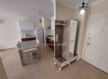 Просторная меблированная квартира с одной спальней, 60м², в комфортабельной резиденции в Махмутларе, Алания ID-19326 фото-8