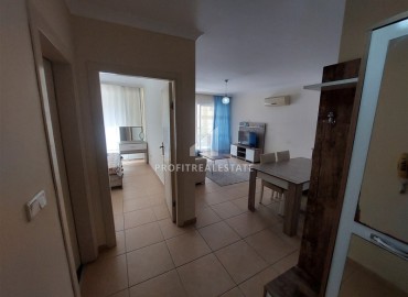 Просторная меблированная квартира с одной спальней, 60м², в комфортабельной резиденции в Махмутларе, Алания ID-19326 фото-10