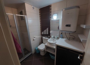 Просторная меблированная квартира с одной спальней, 60м², в комфортабельной резиденции в Махмутларе, Алания ID-19326 фото-11