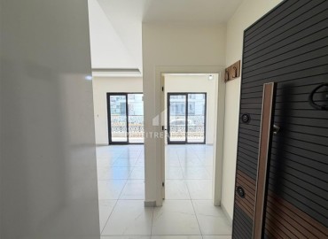 Двухкомнатная квартира, 52м², в комфортабельном комплексе с зимним бассейном в Махмутларе, Алания ID-19329 фото-3