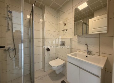 Двухкомнатная квартира, 52м², в комфортабельном комплексе с зимним бассейном в Махмутларе, Алания ID-19329 фото-5