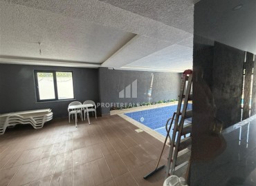 Двухкомнатная квартира, 52м², в комфортабельном комплексе с зимним бассейном в Махмутларе, Алания ID-19329 фото-12