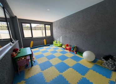 Двухкомнатная квартира, 52м², в комфортабельном комплексе с зимним бассейном в Махмутларе, Алания ID-19329 фото-16