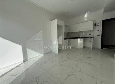 Новые двухкомнатные апартаменты, 55м², в комфортабельном комплексе в районе Махмутлар, Алания, по привлекательной цене ID-19332 фото-1