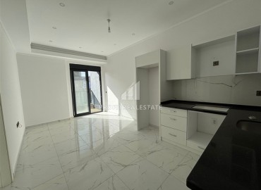 Новые двухкомнатные апартаменты, 55м², в комфортабельном комплексе в районе Махмутлар, Алания, по привлекательной цене ID-19332 фото-3