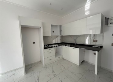 Новые двухкомнатные апартаменты, 55м², в комфортабельном комплексе в районе Махмутлар, Алания, по привлекательной цене ID-19332 фото-4