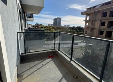 Новые двухкомнатные апартаменты, 55м², в комфортабельном комплексе в районе Махмутлар, Алания, по привлекательной цене ID-19332 фото-10