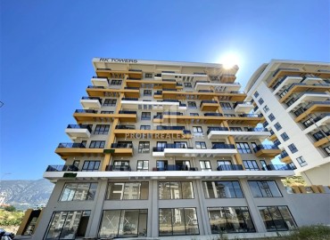 Квартира с одной спальней, 42м², в элитной резиденции в 850м от моря в Махмутларе, Алания ID-19333 фото-1