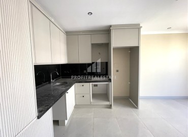 Квартира с одной спальней, 42м², в элитной резиденции в 850м от моря в Махмутларе, Алания ID-19333 фото-3