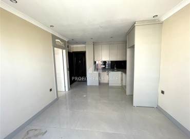 Квартира с одной спальней, 42м², в элитной резиденции в 850м от моря в Махмутларе, Алания ID-19333 фото-4