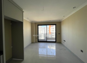 Квартира с одной спальней, 42м², в элитной резиденции в 850м от моря в Махмутларе, Алания ID-19333 фото-6