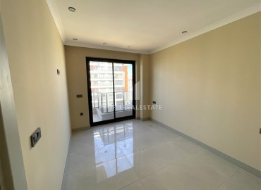 Квартира с одной спальней, 42м², в элитной резиденции в 850м от моря в Махмутларе, Алания ID-19333 фото-7