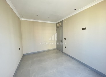 Квартира с одной спальней, 42м², в элитной резиденции в 850м от моря в Махмутларе, Алания ID-19333 фото-9