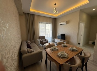Уютная двухкомнатная квартира, 55м², в новостройке с хорошей инфраструктурой в Махмутларе, Алания ID-19335 фото-2