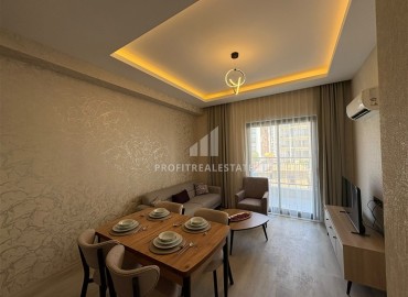 Уютная двухкомнатная квартира, 55м², в новостройке с хорошей инфраструктурой в Махмутларе, Алания ID-19335 фото-4