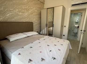 Уютная двухкомнатная квартира, 55м², в новостройке с хорошей инфраструктурой в Махмутларе, Алания ID-19335 фото-7