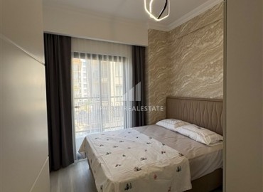 Уютная двухкомнатная квартира, 55м², в новостройке с хорошей инфраструктурой в Махмутларе, Алания ID-19335 фото-8