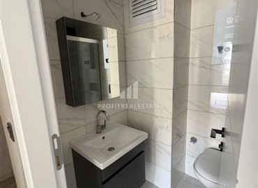 Уютная двухкомнатная квартира, 55м², в новостройке с хорошей инфраструктурой в Махмутларе, Алания ID-19335 фото-10