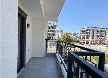 Уютная двухкомнатная квартира, 55м², в новостройке с хорошей инфраструктурой в Махмутларе, Алания ID-19335 фото-12