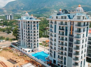 Апартаменты 1+1, 57м², с чистовой отделкой в современном комплексе премиум класса в Махмутларе, Алания ID-19337 фото-1