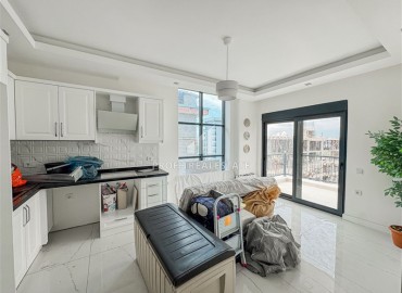 Апартаменты 1+1, 57м², с чистовой отделкой в современном комплексе премиум класса в Махмутларе, Алания ID-19337 фото-4