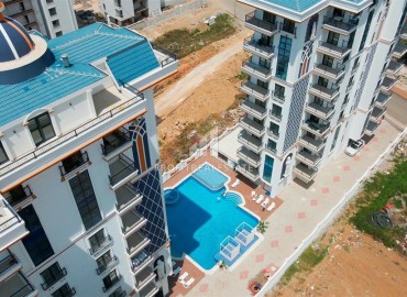 Апартаменты 1+1, 57м², с чистовой отделкой в современном комплексе премиум класса в Махмутларе, Алания ID-19337 фото-26