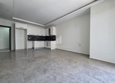 Двухкомнатные апартаменты, 70м², в новой резиденции с хорошей инфраструктурой и отличной локацией в Махмутларе, Алания ID-19338 фото-2