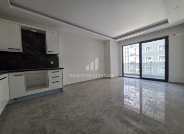 Двухкомнатные апартаменты, 70м², в новой резиденции с хорошей инфраструктурой и отличной локацией в Махмутларе, Алания ID-19338 фото-4