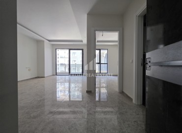 Двухкомнатные апартаменты, 70м², в новой резиденции с хорошей инфраструктурой и отличной локацией в Махмутларе, Алания ID-19338 фото-6