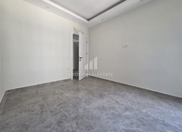 Двухкомнатные апартаменты, 70м², в новой резиденции с хорошей инфраструктурой и отличной локацией в Махмутларе, Алания ID-19338 фото-8