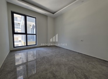 Двухкомнатные апартаменты, 70м², в новой резиденции с хорошей инфраструктурой и отличной локацией в Махмутларе, Алания ID-19338 фото-9