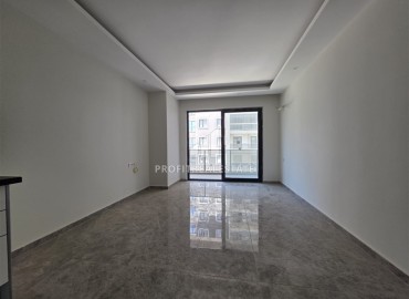 Двухкомнатные апартаменты, 70м², в новой резиденции с хорошей инфраструктурой и отличной локацией в Махмутларе, Алания ID-19338 фото-10
