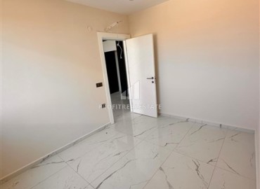 Новые двухкомнатные апартаменты, 55м² в комплексе премиум-класса от ведущего застройщика, в Авсалларе, Алания ID-19344 фото-9