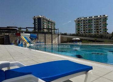 Новые двухкомнатные апартаменты, 55м² в комплексе премиум-класса от ведущего застройщика, в Авсалларе, Алания ID-19344 фото-14