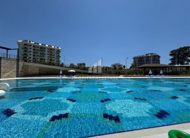 Новые двухкомнатные апартаменты, 55м² в комплексе премиум-класса от ведущего застройщика, в Авсалларе, Алания ID-19344 фото-20