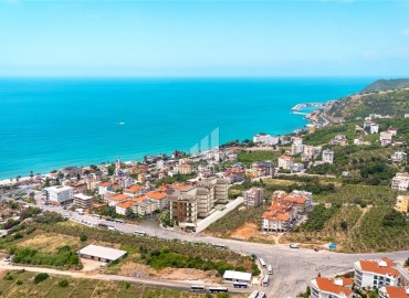 Инвестиционное предложение на этапе проекта: квартиры 56-264,8м², в резиденции в центре Алании, 300м от моря ID-19345 фото-2