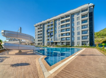 Элегантная квартира с одной спальней, 65м², с видом на горы в премиум комплексе в районе Алании – Газипаша ID-19346 фото-1