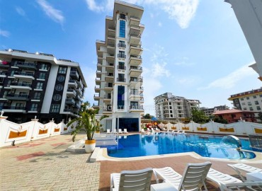 Элегантная квартира с одной спальней, 57м², в новом комплексе премиум класса в 700 метрах от моря в Махмутларе, Алания ID-19352 фото-1