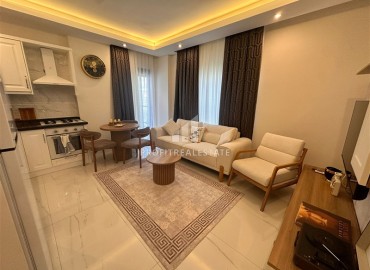 Элегантная квартира с одной спальней, 57м², в новом комплексе премиум класса в 700 метрах от моря в Махмутларе, Алания ID-19352 фото-2