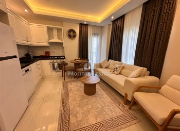 Элегантная квартира с одной спальней, 57м², в новом комплексе премиум класса в 700 метрах от моря в Махмутларе, Алания ID-19352 фото-4