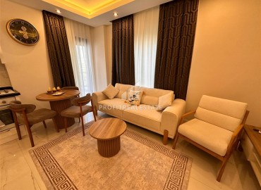 Элегантная квартира с одной спальней, 57м², в новом комплексе премиум класса в 700 метрах от моря в Махмутларе, Алания ID-19352 фото-5