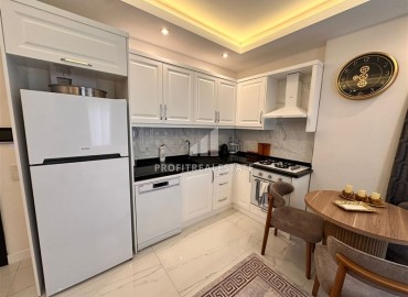 Элегантная квартира с одной спальней, 57м², в новом комплексе премиум класса в 700 метрах от моря в Махмутларе, Алания ID-19352 фото-7