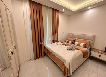 Элегантная квартира с одной спальней, 57м², в новом комплексе премиум класса в 700 метрах от моря в Махмутларе, Алания ID-19352 фото-11