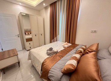 Элегантная квартира с одной спальней, 57м², в новом комплексе премиум класса в 700 метрах от моря в Махмутларе, Алания ID-19352 фото-12