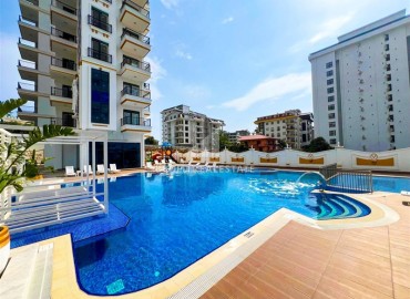 Элегантная квартира с одной спальней, 57м², в новом комплексе премиум класса в 700 метрах от моря в Махмутларе, Алания ID-19352 фото-17